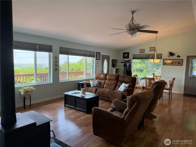 Open concept living with cathedral ceilings.