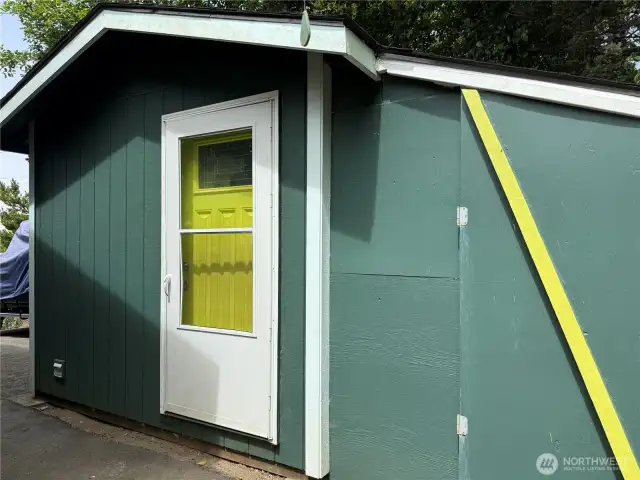 Laundry is in an installed outbuilding with room for hobbies or storage.