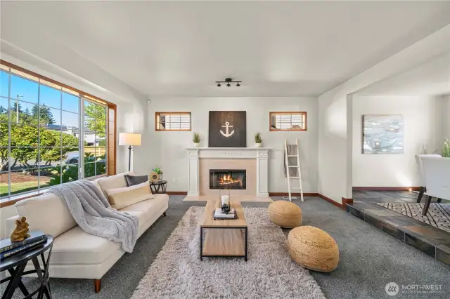 Formal living room w/ cozy fireplace