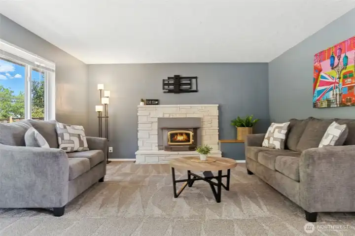 Spacious family room with wood burning fireplace