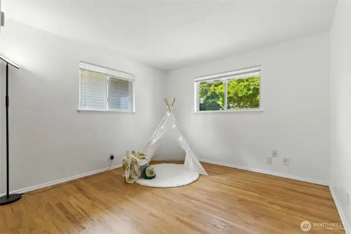 Second bedroom with original hardwood floors