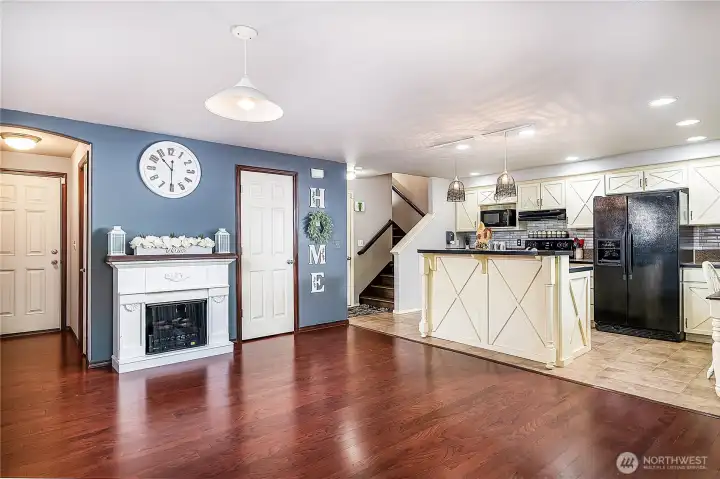 The warmth of the gleaming hardwood floors are so inviting!