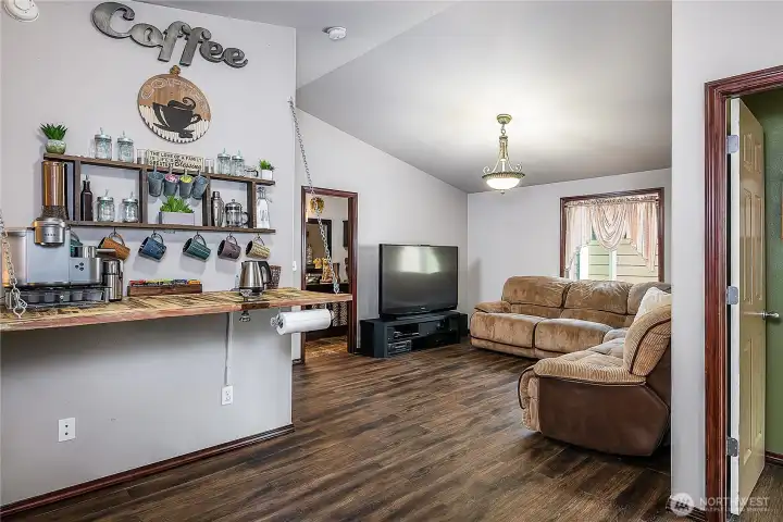 Great room/theater area complete with custom decorator coffee/beverage bar!! So stylish!