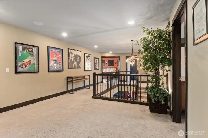Upsrairs space is functional instead of just a hallway! Great spot for a reading nook or another loungin area.