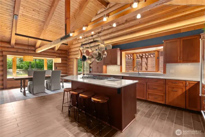 Spacious kitchen with cherry cabinetry, granite countertops. Spacious kitchen with cherry cabinetry, granite countertops.