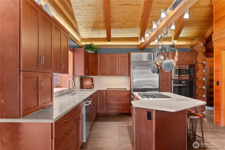 Chef’s kitchen includes a Wolf range, Sub-Zero refrigerator, prep kitchen, and walk-in pantry. Chef’s kitchen includes a Wolf range, Sub-Zero refrigerator, prep kitchen, and walk-in pantry.