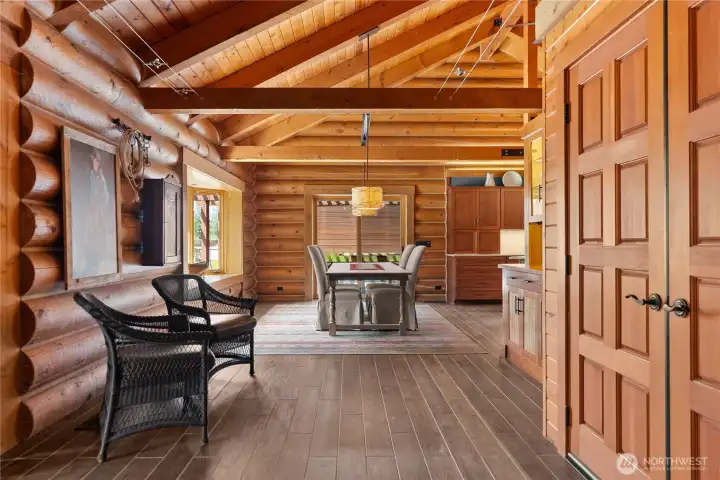Inside features log walls, tongue-and-groove pine walls, exposed beam ceilings, custom built ins. Inside features log walls, tongue-and-groove pine walls, exposed beam ceilings, custom built ins.