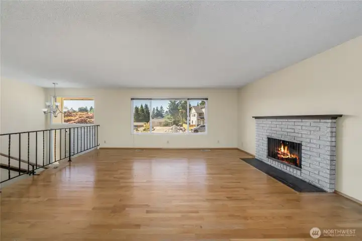 Spacious living room with hardwood floors