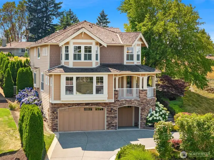 Timeless Pacific Northwest Craftsman architecture showcases exceptional curb appeal, enduring quality, and meticulous maintenance in one of Newcastle's premier hilltop neighborhoods. Timeless Pacific Northwest Craftsman architecture showcases exceptional curb appeal, enduring quality, and meticulous maintenance in one of Newcastle's premier hilltop neighborhoods.