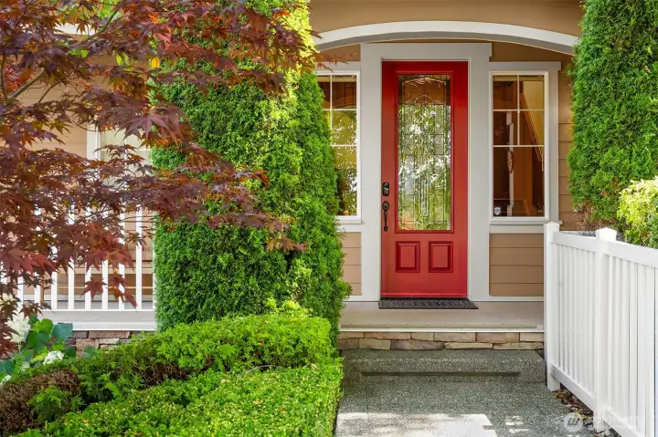 The inviting front entry combines classic Craftsman character with beautifully maintained landscaping, setting the tone for the quality found throughout the home. The inviting front entry combines classic Craftsman character with beautifully maintained landscaping, setting the tone for the quality found throughout the home.