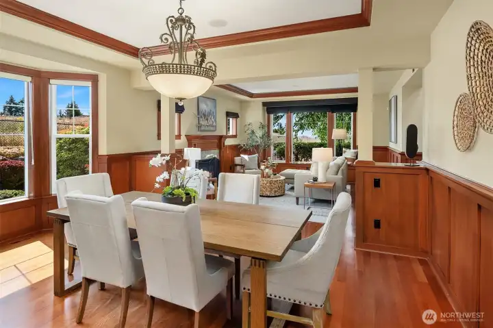 The formal dining room seamlessly connects to the living spaces, creating an elegant setting for both intimate dinners and larger gatherings. The formal dining room seamlessly connects to the living spaces, creating an elegant setting for both intimate dinners and larger gatherings.