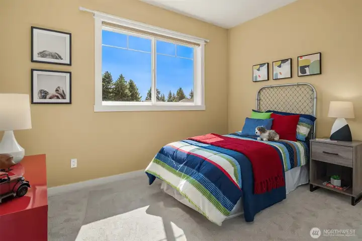 Large windows welcome natural light while creating a bright, comfortable retreat designed to grow with every stage of life. Large windows welcome natural light while creating a bright, comfortable retreat designed to grow with every stage of life.