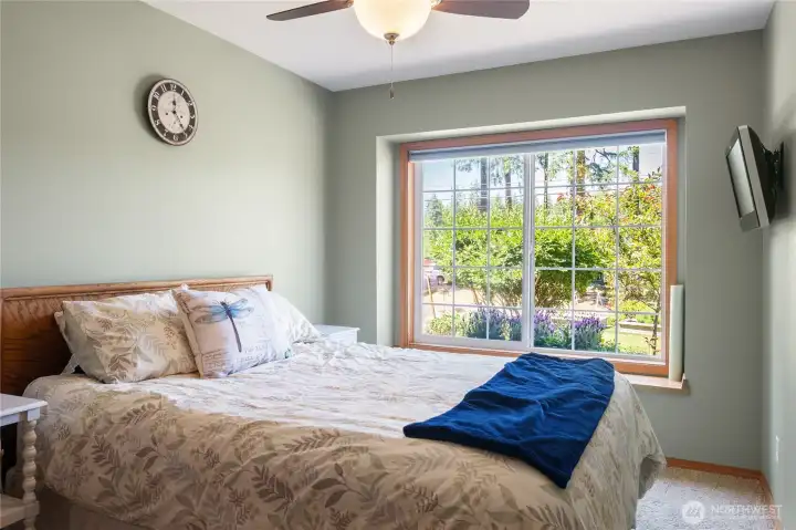 Ceiling fan and bedroom 1 looks to the front of the home. Ceiling fan and bedroom 1 looks to the front of the home.
