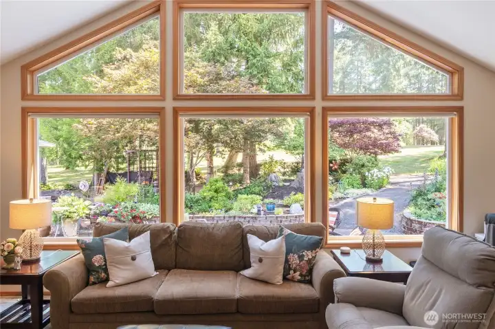 Great room looks to the backyard that is mature landscape and low maintenace. Patio ready for your bbqs and quiet evenings. Great room looks to the backyard that is mature landscape and low maintenace. Patio ready for your bbqs and quiet evenings.