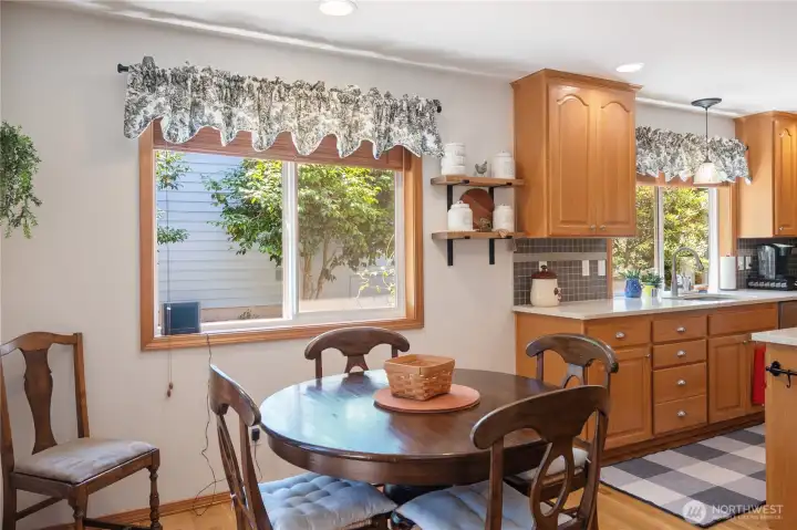 Dining nook leads to the covered deck off the back slider. Dining nook leads to the covered deck off the back slider.