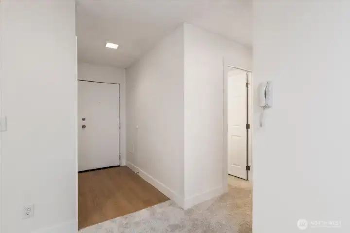 Entryway and hallway leading to all 3 bedrooms, hall bath and coat closet. Entryway and hallway leading to all 3 bedrooms, hall bath and coat closet.