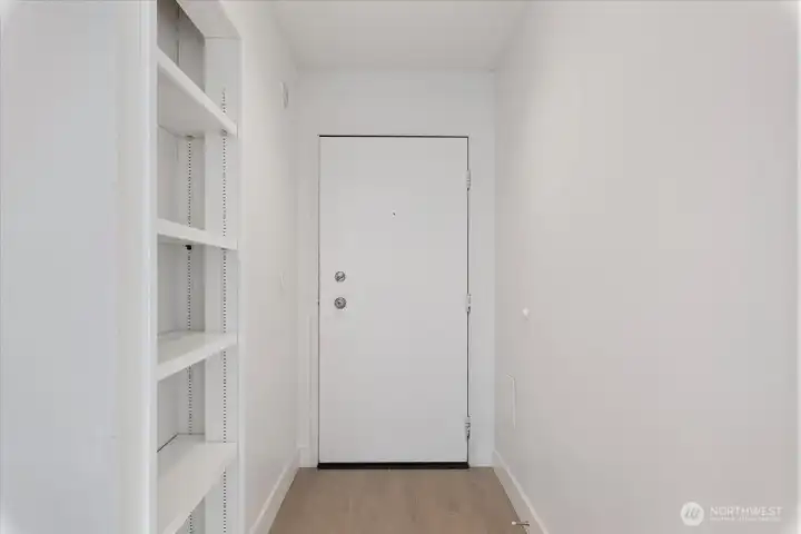 Entryway with additional storage for shoes, books, etc.. Entryway with additional storage for shoes, books, etc..