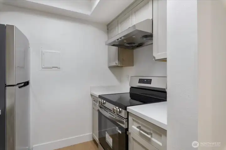 New appliance package includes glass cooktop stove with high powered stainless steel vent hood New appliance package includes glass cooktop stove with high powered stainless steel vent hood