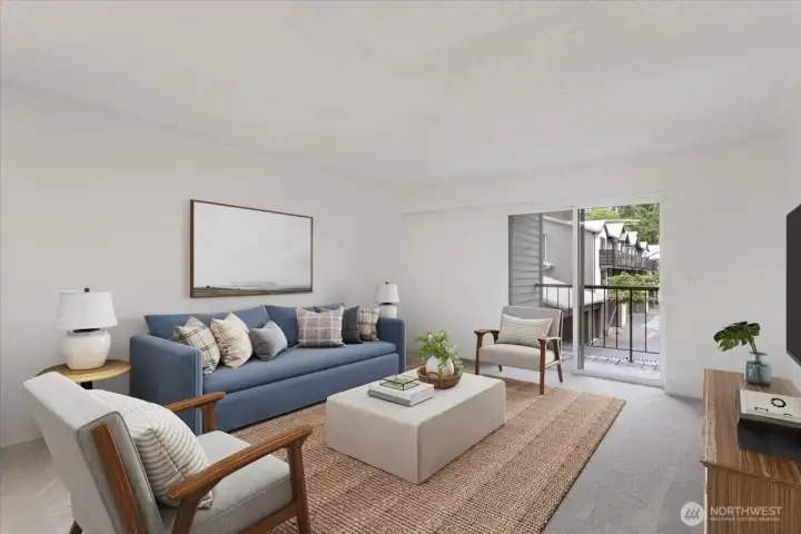 Expansive living room with space to stretch out! Private deck to have new custom railings replaced by HOA soon! (virtually staged) Expansive living room with space to stretch out! Private deck to have new custom railings replaced by HOA soon! (virtually staged)