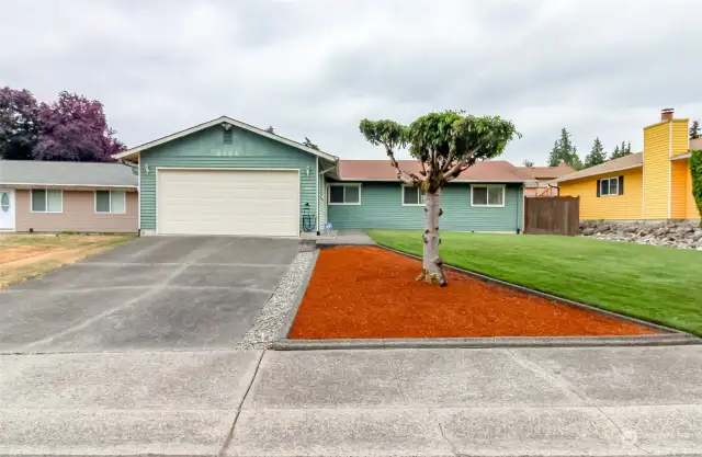 Welcome home... neat and meticulous yard leads you to a spacious move in ready rambler!