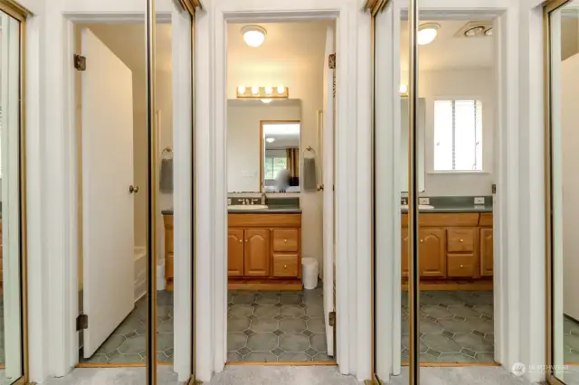 Not one but two mirrored closets on each side of the private primary bathroom!