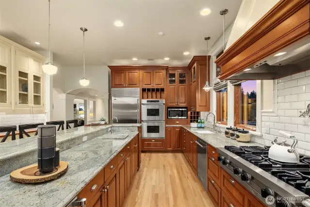Double Dacor ovens, a subzero fridge and an undercounter wine fridge are a few features offered in this state of the art epicurean's dream kitchen.
