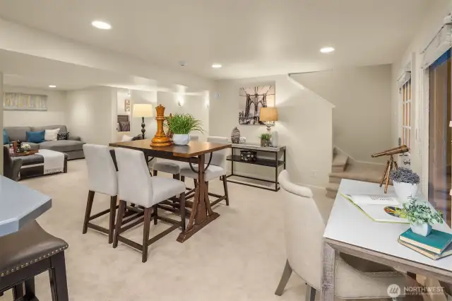Welcome to the sunny fully equipped lower level. This space is so versatile ... it could be the nanny's quarter, the man cave, the ideal bonus play area or even the space for your mother-in-law!