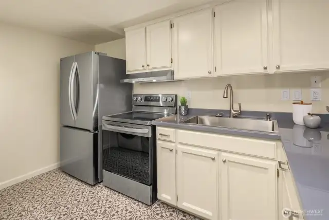 A second kitchen sure comes in handy for a second living situation or even when throwing a big party. Not pictured to the opposite of the refrigerator is a full-size washer and dryer ... the 2nd laundry in the house.