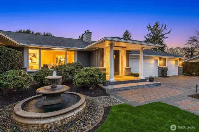 The front yard paradise boasts at painted pergola and bubbly fountain... all part of creating a soothing ambience the minute you step foot on the property.