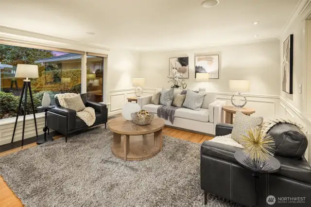 Presenting a spacious living room with plenty of room for a grand piano ... this formal space truly epitomizes the aesthetic of refined sophistication.