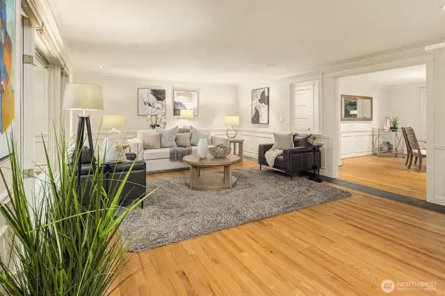 Light and airy, take in the essence of classically designed beauty. Freshly refinished hardwood floors are accented by a lovely slate surround adding an element of richness.