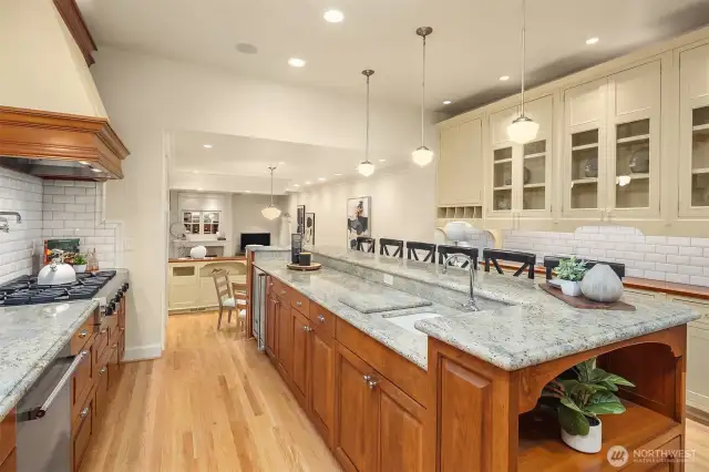All custom cabinetry...  note the stunning painted cabinets with cherry tops and glass doors  on the right hand side of this picture.