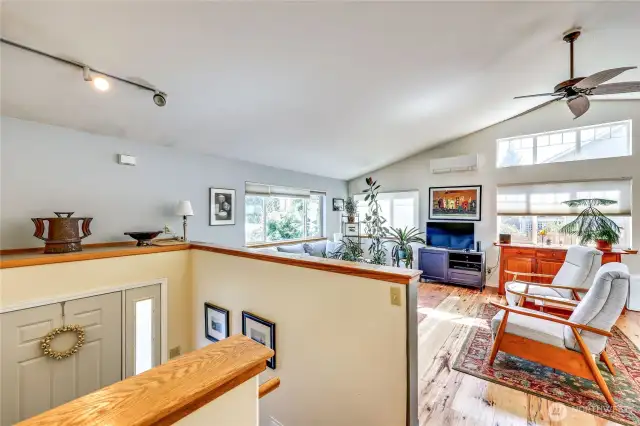 As you enter the front door, you will enter a light-filled living room. Vaulted ceilings, plenty of windows and mini-split for heating and cooling.