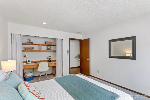 A clever use of space with a built-in office nook and shelving for those who work from home.