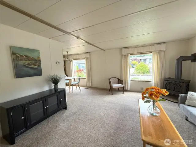 Nice bright open living room and dining area.