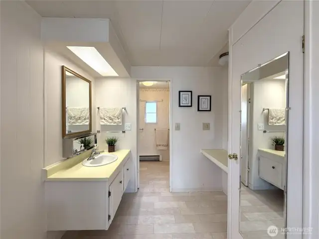 Primary ensuite with plenty of counter space and room for your morning routines