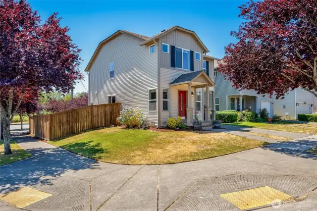 Lake Stevens Pasadera 4 bedroom on a corner lot. Driveway parking. Exterior washed, covered entry restained, deck painted, fresh entry pots add to the curb appeal.