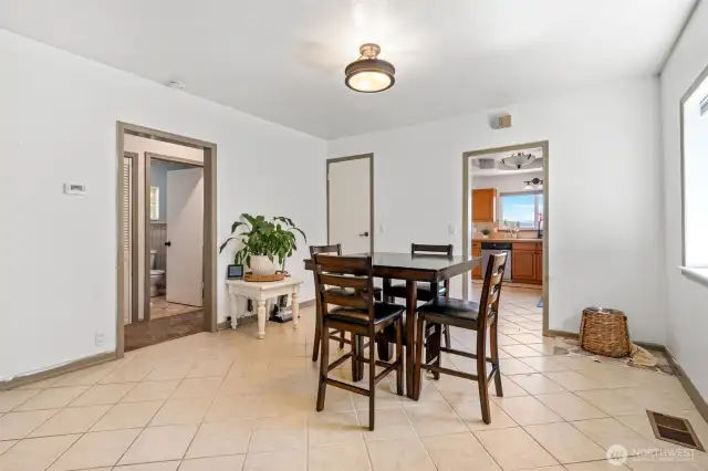 Dining, Hall to bath and bedrooms to the left and Kitches access to the right.