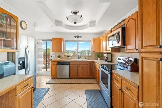 Kitchen.  The beautiful trey ceilings and moulding bring quality features to this space.