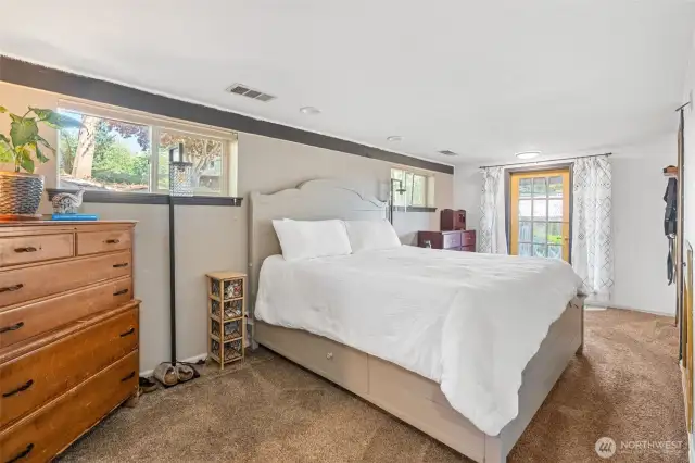 Lower Primary Bedroom.  Has private access to bath