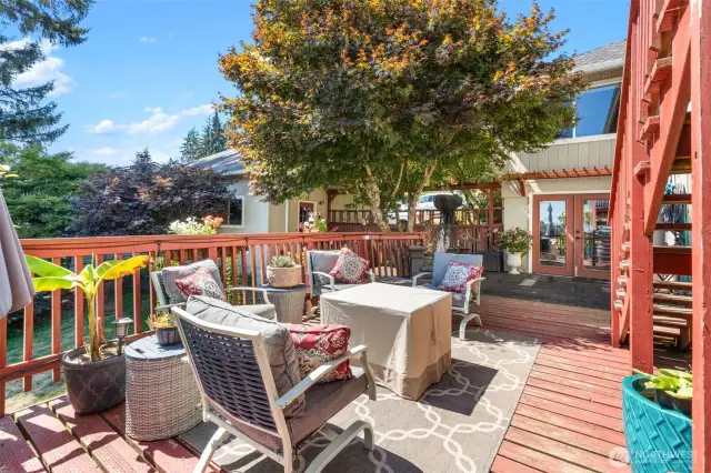 Deck off lower patio connecting to lower family room.  Currently a Firepit for RR