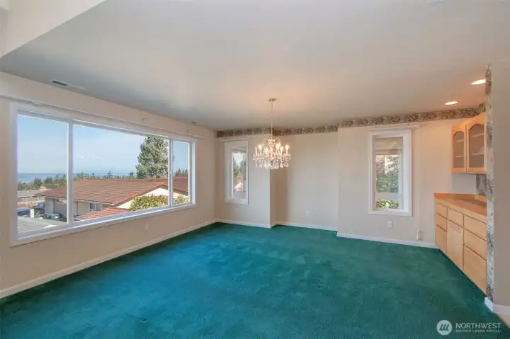 Dining Room with built-in cabinet and serving bar.
