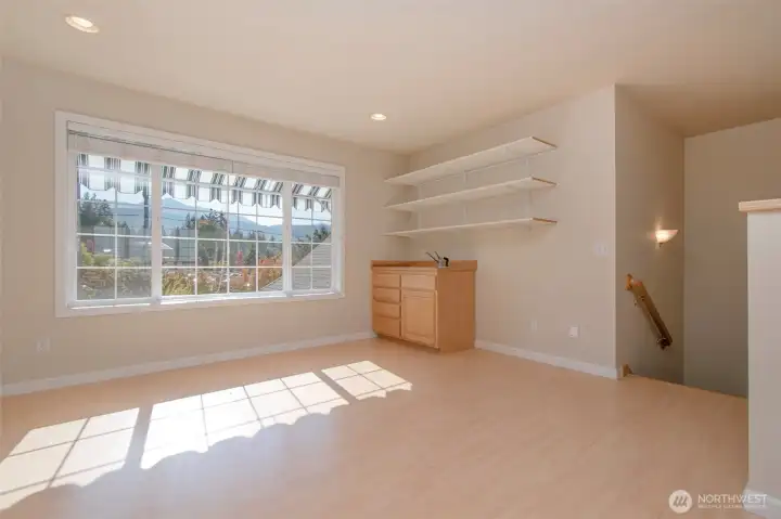 Loft with wet bar.