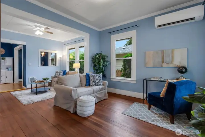 High ceilings and original floors greet you when you open the front door. A ductless mini-split provides heat and AC. Many energy efficient upgrades were made by previous owner, including insulation and newer windows!