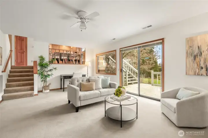 Rec room w/slider access to lower deck & stairs to main level