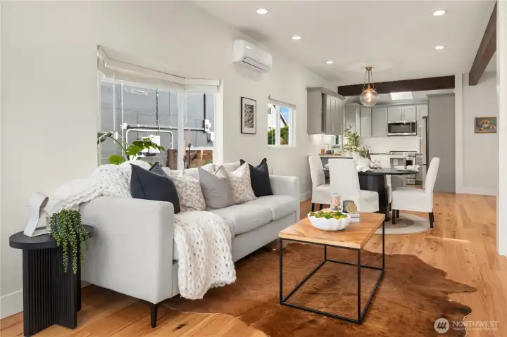 The open beams are throughout the main level bringing an architectural flair to this immaculate home with updated systems.