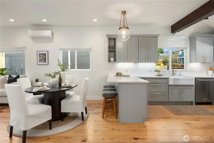 This shot shows the gracious space alloted to the dining room. The mini-split provides heat and A/C.