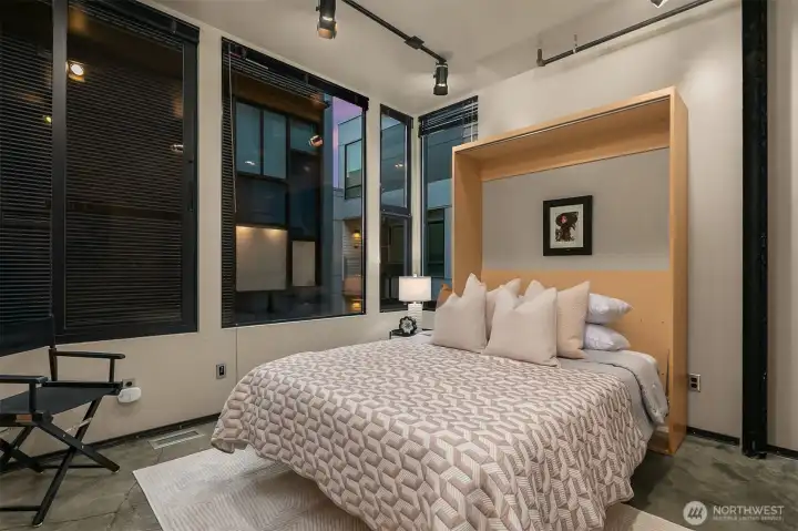 Third bedroom with murphy bed & ensuite bath.