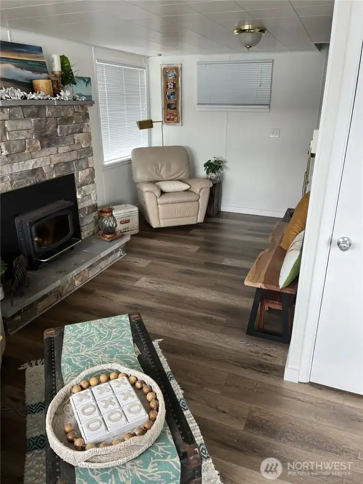 Intimate living room with cozy wood fire insert.