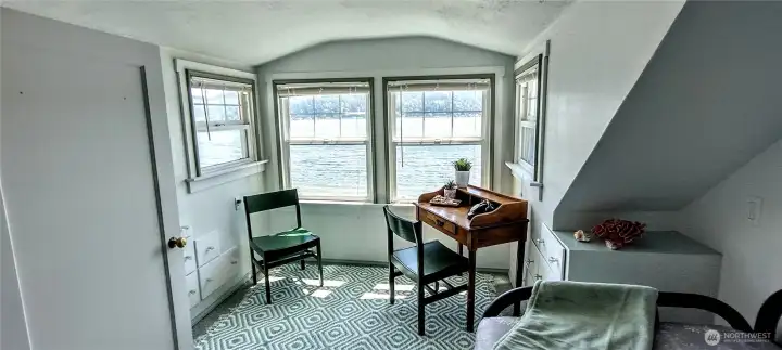 Second bedroom on the upper floor. Perfect for reading a book or a lazy afternoon nap.